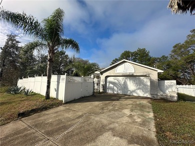 Check out this affordable Citrus Springs home featuring a split on Pine Ridge Community Golf and Country Club in Florida - for sale on GolfHomes.com, golf home, golf lot