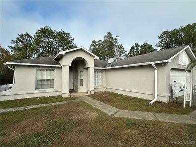 Check out this affordable Citrus Springs home featuring a split on Pine Ridge Community Golf and Country Club in Florida - for sale on GolfHomes.com, golf home, golf lot