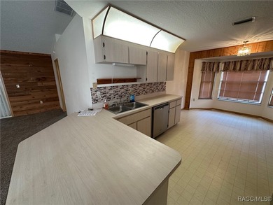 Check out this affordable Citrus Springs home featuring a split on Pine Ridge Community Golf and Country Club in Florida - for sale on GolfHomes.com, golf home, golf lot