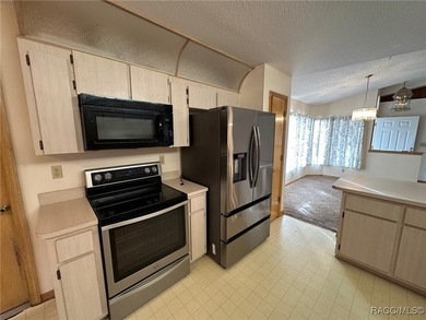 Check out this affordable Citrus Springs home featuring a split on Pine Ridge Community Golf and Country Club in Florida - for sale on GolfHomes.com, golf home, golf lot