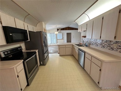 Check out this affordable Citrus Springs home featuring a split on Pine Ridge Community Golf and Country Club in Florida - for sale on GolfHomes.com, golf home, golf lot