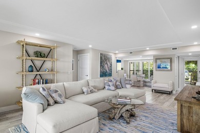 Welcome to this inviting 1stfloor home showcasing serene golf on Quail Ridge Golf Course and Country Club in Florida - for sale on GolfHomes.com, golf home, golf lot