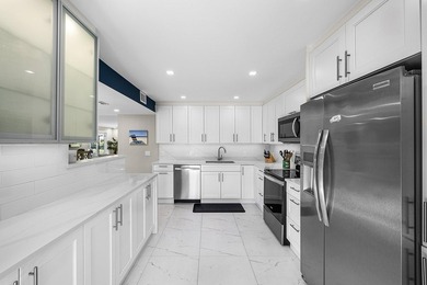 Welcome to this inviting 1stfloor home showcasing serene golf on Quail Ridge Golf Course and Country Club in Florida - for sale on GolfHomes.com, golf home, golf lot