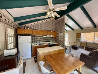 This darling little Lake Almanor Country Club cabin could be the on Lake Almanor Country Club in California - for sale on GolfHomes.com, golf home, golf lot