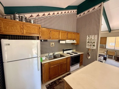 This darling little Lake Almanor Country Club cabin could be the on Lake Almanor Country Club in California - for sale on GolfHomes.com, golf home, golf lot