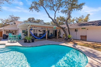 Beautifully updated and ideally located, this Harbor Oaks home on Rockport Country Club in Texas - for sale on GolfHomes.com, golf home, golf lot