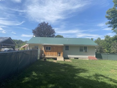Located in the quaint village of Wells, near one of Vermont's on Lake St. Catherine Country Club in Vermont - for sale on GolfHomes.com, golf home, golf lot