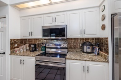 3/3/2 CBS Charming Courtyard Home with pool. Lakefront home is on Lost Lake Golf Club in Florida - for sale on GolfHomes.com, golf home, golf lot