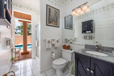 3/3/2 CBS Charming Courtyard Home with pool. Lakefront home is on Lost Lake Golf Club in Florida - for sale on GolfHomes.com, golf home, golf lot