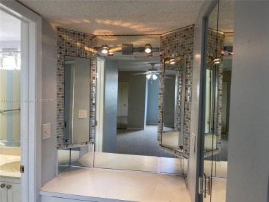 Welcome to your serene retreat at 3940 Inverrary Blvd., #701A--a on Inverrary Country Club in Florida - for sale on GolfHomes.com, golf home, golf lot