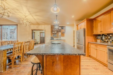 Discover a proven income-producing retreat, perfectly positioned on Wilderness Club in Montana - for sale on GolfHomes.com, golf home, golf lot