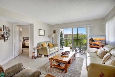 This immaculate corner unit in a newer building of a great 55+ on Flamingo Lakes Country Club in Florida - for sale on GolfHomes.com, golf home, golf lot