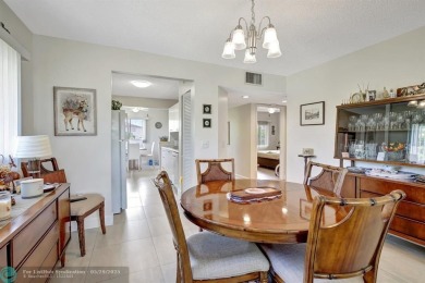 This immaculate corner unit in a newer building of a great 55+ on Flamingo Lakes Country Club in Florida - for sale on GolfHomes.com, golf home, golf lot