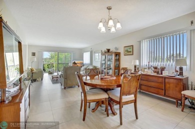 This immaculate corner unit in a newer building of a great 55+ on Flamingo Lakes Country Club in Florida - for sale on GolfHomes.com, golf home, golf lot