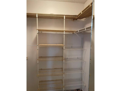 Welcome to your serene retreat at 3940 Inverrary Blvd., #701A--a on Inverrary Country Club in Florida - for sale on GolfHomes.com, golf home, golf lot