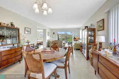 This immaculate corner unit in a newer building of a great 55+ on Flamingo Lakes Country Club in Florida - for sale on GolfHomes.com, golf home, golf lot