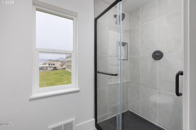 Experience coastal living at its finest in this fully updated on Chinook Winds Golf Resort in Oregon - for sale on GolfHomes.com, golf home, golf lot