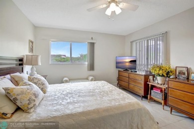 This immaculate corner unit in a newer building of a great 55+ on Flamingo Lakes Country Club in Florida - for sale on GolfHomes.com, golf home, golf lot