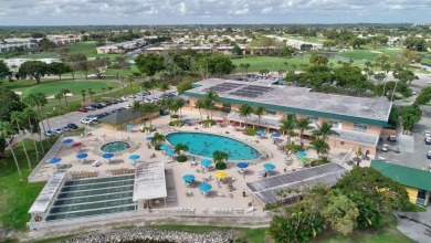 Charming, fully furnished 1st floor corner unit in Kings Point on Kings Point Golf -Flanders Way in Florida - for sale on GolfHomes.com, golf home, golf lot