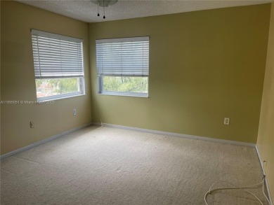 Welcome to your serene retreat at 3940 Inverrary Blvd., #701A--a on Inverrary Country Club in Florida - for sale on GolfHomes.com, golf home, golf lot