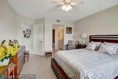 This immaculate corner unit in a newer building of a great 55+ on Flamingo Lakes Country Club in Florida - for sale on GolfHomes.com, golf home, golf lot