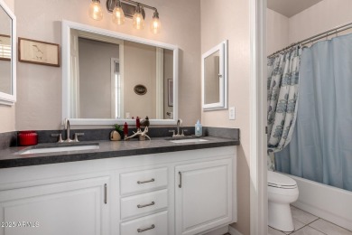 A truly exceptional home nestled on a peaceful cul-de-sac next on Troon Country Club in Arizona - for sale on GolfHomes.com, golf home, golf lot