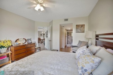 This immaculate corner unit in a newer building of a great 55+ on Flamingo Lakes Country Club in Florida - for sale on GolfHomes.com, golf home, golf lot