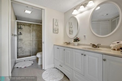 This immaculate corner unit in a newer building of a great 55+ on Flamingo Lakes Country Club in Florida - for sale on GolfHomes.com, golf home, golf lot