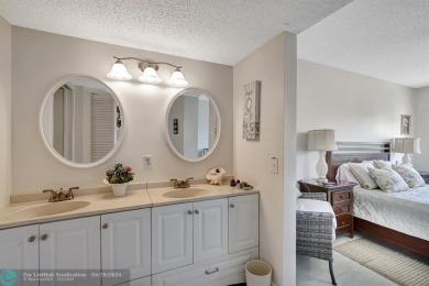 This immaculate corner unit in a newer building of a great 55+ on Flamingo Lakes Country Club in Florida - for sale on GolfHomes.com, golf home, golf lot