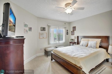 This immaculate corner unit in a newer building of a great 55+ on Flamingo Lakes Country Club in Florida - for sale on GolfHomes.com, golf home, golf lot