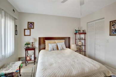 This immaculate corner unit in a newer building of a great 55+ on Flamingo Lakes Country Club in Florida - for sale on GolfHomes.com, golf home, golf lot
