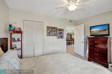 This immaculate corner unit in a newer building of a great 55+ on Flamingo Lakes Country Club in Florida - for sale on GolfHomes.com, golf home, golf lot