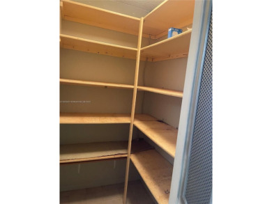 Welcome to your serene retreat at 3940 Inverrary Blvd., #701A--a on Inverrary Country Club in Florida - for sale on GolfHomes.com, golf home, golf lot