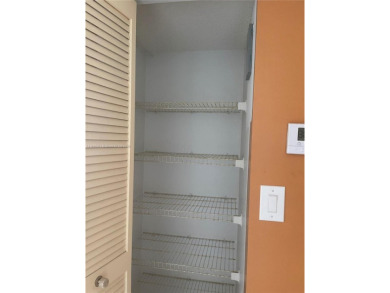 Welcome to your serene retreat at 3940 Inverrary Blvd., #701A--a on Inverrary Country Club in Florida - for sale on GolfHomes.com, golf home, golf lot