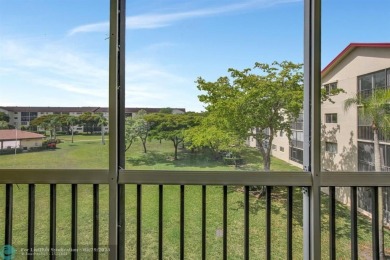 This immaculate corner unit in a newer building of a great 55+ on Flamingo Lakes Country Club in Florida - for sale on GolfHomes.com, golf home, golf lot