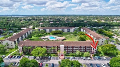 This immaculate corner unit in a newer building of a great 55+ on Flamingo Lakes Country Club in Florida - for sale on GolfHomes.com, golf home, golf lot