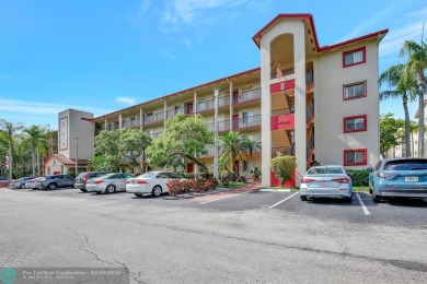 This immaculate corner unit in a newer building of a great 55+ on Flamingo Lakes Country Club in Florida - for sale on GolfHomes.com, golf home, golf lot