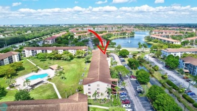 This immaculate corner unit in a newer building of a great 55+ on Flamingo Lakes Country Club in Florida - for sale on GolfHomes.com, golf home, golf lot