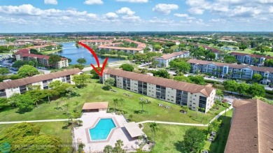 This immaculate corner unit in a newer building of a great 55+ on Flamingo Lakes Country Club in Florida - for sale on GolfHomes.com, golf home, golf lot
