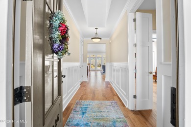 Discover this beautiful, low-maintenance patio home by Hagood on Compass Pointe Golf Course in North Carolina - for sale on GolfHomes.com, golf home, golf lot