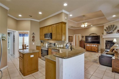 Nestled by the serene orchard of Pecan Plantation, this on Pecan Plantation Country Club in Texas - for sale on GolfHomes.com, golf home, golf lot