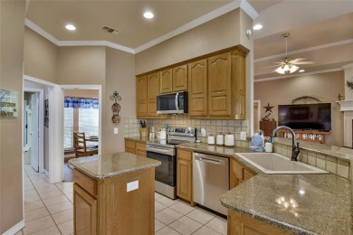 Nestled by the serene orchard of Pecan Plantation, this on Pecan Plantation Country Club in Texas - for sale on GolfHomes.com, golf home, golf lot