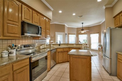 Nestled by the serene orchard of Pecan Plantation, this on Pecan Plantation Country Club in Texas - for sale on GolfHomes.com, golf home, golf lot