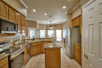 Nestled by the serene orchard of Pecan Plantation, this on Pecan Plantation Country Club in Texas - for sale on GolfHomes.com, golf home, golf lot