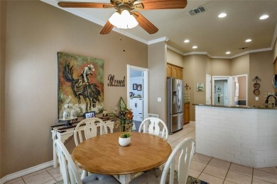 Nestled by the serene orchard of Pecan Plantation, this on Pecan Plantation Country Club in Texas - for sale on GolfHomes.com, golf home, golf lot
