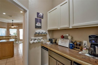 Nestled by the serene orchard of Pecan Plantation, this on Pecan Plantation Country Club in Texas - for sale on GolfHomes.com, golf home, golf lot