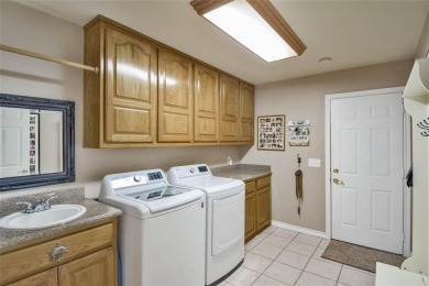 Nestled by the serene orchard of Pecan Plantation, this on Pecan Plantation Country Club in Texas - for sale on GolfHomes.com, golf home, golf lot