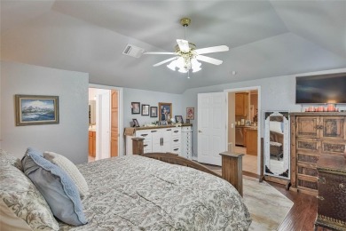 Nestled by the serene orchard of Pecan Plantation, this on Pecan Plantation Country Club in Texas - for sale on GolfHomes.com, golf home, golf lot