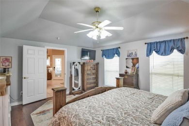 Nestled by the serene orchard of Pecan Plantation, this on Pecan Plantation Country Club in Texas - for sale on GolfHomes.com, golf home, golf lot