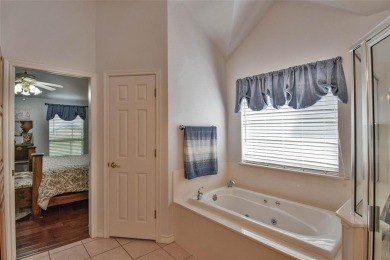 Nestled by the serene orchard of Pecan Plantation, this on Pecan Plantation Country Club in Texas - for sale on GolfHomes.com, golf home, golf lot